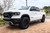 White 2021 Ram 1500 with Black Rhino Attica Wheels