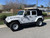 White 2018 Jeep Wrangler with Black Rhino Axle Wheels