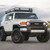 White Toyota FJ Cruiser with Black Rhino Barricade Wheels