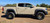 Tan Chevy Colorado with Black Rhino Baker Bronze Wheels