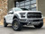 White 2023 Ford Raptor with Bronze Black Rhino Baker Wheels