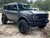 Grey 2023 Ford Bronco Outer Banks with Black Rhino Atlas Rims