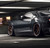 Rohana RFX11 brushed titanium wheels on a black Camaro