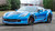 Rohana RFX10 gloss black wheels on a blue Chevrolet Corvette.