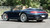 Rohana RFX10 brushed titanium wheels on a blue Porsche 911 Carrera.