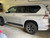 Silver Lexus GX with Gunmetal Enkei Cyclone Wheels