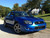 Blue Subaru WRX with Hyper Black Enkei EV5 Machined Lip Wheels