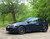 Blue Volkswagen Golf GTI with Matte Dark Gunmetallic Enkei GTC01RR Wheels