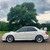 White 2007 Subaru STI with Silver Enkei NT03+M Wheels