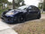 Blue Subaru WRX Hatchback with Black Enkei NT03+M Wheels