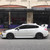 White VA Subaru STI with Gunmetal Enkei NT03RR Wheels