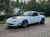 White NA Mazda Miata with Dark Silver Enkei PF05 Rims