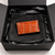 Comes in black box packaging