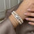 Two Strand White Freshwater Pearl and Silver Cross Stretch Bracelet