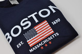 Boston Stars and Stripes crewneck sweatshirt with American flag graphic, available in sport grey and navy.