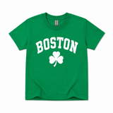 Youth Kelly Green Boston Shamrock T-shirt featuring a white collegiate BOSTON graphic and lucky clover design on a Gildan short sleeve tee.