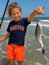 Kids navy Boston t-shirt featuring a classic red and white collegiate-style Boston graphic, available in youth sizes 4T through Kids Large.