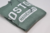 Unisex heather green Boston MA hoodie with distressed white screen print lettering and kangaroo pocket.