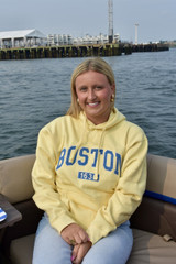 Boston 1630 appliqué hooded sweatshirt featuring collegiate-style lettering, available in maroon, navy, and butter yellow colors with a front kangaroo pocket and adjustable hood.