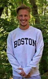 Champion Reverse Weave silver crewneck sweatshirt with navy arched Boston lettering and "C" logo on sleeve.