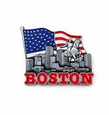 Boston souvenir magnet featuring a city skyline, patriotic flag backdrop, Paul Revere statue, historic rider statue, and bold Boston lettering.