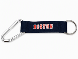 Navy Boston carabiner keychain with silver metal clip and key ring on a white background.