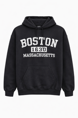 Boston 1630 Massachusetts unisex Gildan hood in black with white distressed scree-printed lettering, pullover style with kangaroo pocket.