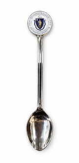 Polished metal Boston souvenir collector spoon featuring a Massachusetts-themed decorative medallion handle.