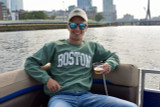 Boston crew neck sweatshirt with distressed lettering. Available in Heather Green and Navy. Classic unisex Boston sweatshirt with vintage collegiate style.
