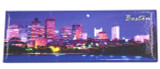 Panoramic Boston skyline magnet featuring the city illuminated at night with waterfront reflections and vibrant city lights.