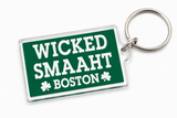 Green Wicked Smaaht Boston acrylic keychain featuring white lettering, shamrock accents, and a silver metal key ring.
