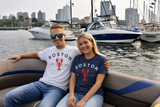 Inspired by Boston's historic waterfront and New England lobster tradition, this Boston Lobster T-Shirt features a bold red lobster graphic and classic Boston lettering. Printed on a premium Gildan® Heavy Cotton tee and available in Ash and Heather Navy in Adult sizes Small through X-Large. A perfect souvenir, gift, or everyday Boston favorite.