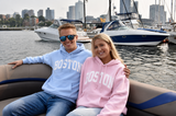 Boston arch hoodie light pink and light blue Gildan sweatshirt with white screen print.
