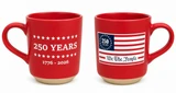 Red matte sandstone mug with 250 Years 1776-2026 design and American flag "We The People" graphic.