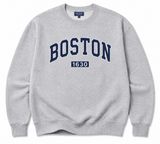 Heather grey Nantucket Fleece crewneck sweatshirt featuring navy Boston lettering with a white outline and 1630 graphic on the front.