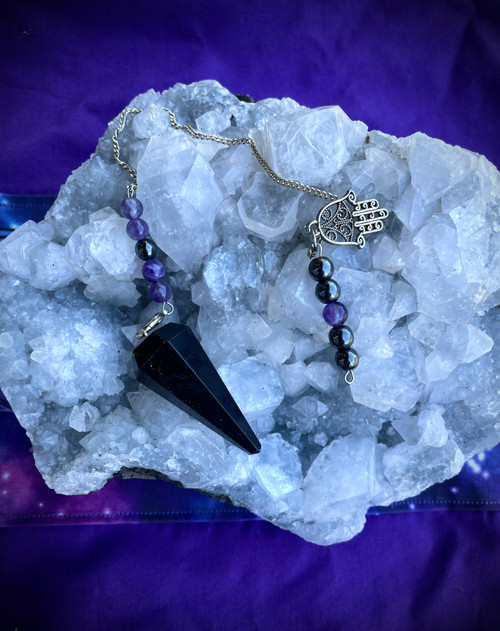 Black tourmaline pendulum with hematite and amethyst beads and a hamsa charm