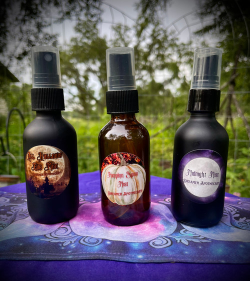 Halloween Mist Set- All Hallows Eve, Pumpkin Spice, Midnight. Halloween Mist Set - Get all 3 Spooky Scent Mists!
~All Hallows Eve Mist is protective, grounding, and great for ancestral connection. This is the perfect Halloween scent of earth and pumpkin spice- like a myserious, night time cemetary stroll under the Full Moon!
The essential oils in this blend are Cypress, Oakmoss, Cedar, Clove, and Nutmeg. It is infused with Obsidian and Carnelian.
~Freshen the air is your home with our Pumpkin Spice Mist - the most notorious scent of the fall season! This warm fall scent is also great for prosperity and protection! Use as a room spray or perfume body spray! Please note - cinnamon essential oil has a high probablitly of causing reactions so limit use on direct skin and always do a small test spot first!
The essential oils in this blend are nutmeg, clove, orange and cinnamon. It is infused with carnelian chip stones.
~Deep and dark, our Midnight Mist holds an air of mystery, grounding, transformation, and a touch of magic. This earthy blend is one to call upon when looking to bring about great change and abundance. It is also extremely protective. Use as a room spray or perfume body spray!
The essential oils in this blend are patchouli, allspice, vetiver, and oak moss. It is infused with moonstone with smoky quartz. Dreamer Apothecary Halloween Mist Set- All Hallows Eve, Pumpkin Spice, Midnight. Halloween Mist Set - Get all 3 Spooky Scent Mists!
~All Hallows Eve Mist is protective, grounding, and great for ancestral connection. This is the perfect Halloween scent of earth and pumpkin spice- like a myserious, night time cemetary stroll under the Full Moon!
The essential oils in this blend are Cypress, Oakmoss, Cedar, Clove, and Nutmeg. It is infused with Obsidian and Carnelian.
~Freshen the air is your home with our Pumpkin Spice Mist - the most notorious scent of the fall season! This warm fall scent is also great for prosperity and protection! Use as a room spray or perfume body spray! Please note - cinnamon essential oil has a high probablitly of causing reactions so limit use on direct skin and always do a small test spot first!
The essential oils in this blend are nutmeg, clove, orange and cinnamon. It is infused with carnelian chip stones.
~Deep and dark, our Midnight Mist holds an air of mystery, grounding, transformation, and a touch of magic. This earthy blend is one to call upon when looking to bring about great change and abundance. It is also extremely protective. Use as a room spray or perfume body spray!
The essential oils in this blend are patchouli, allspice, vetiver, and oak moss. It is infused with moonstone with smoky quartz. Dreamer Apothecary