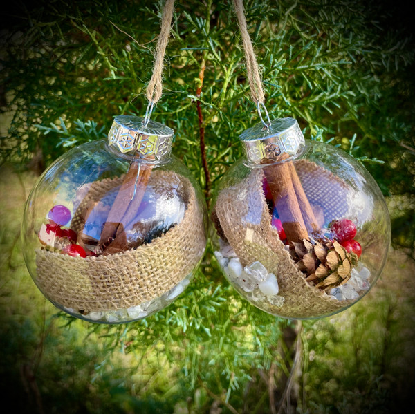 Handcrafted Christmas ornaments with clear quartz, howlite, burlap ribbon, real cinnamon sticks, pinecones, and artificial berries. Shatter-proof and perfect for your tree or home decor.

Christmas ornaments, nature-inspired ornaments, rustic holiday decor, handcrafted ornaments, shatter-proof Christmas ornaments, clear quartz ornaments, howlite ornaments, pinecone decor, holiday decorations, cinnamon stick ornaments, yule ball, yule decor,
 Dreamer Apothecary