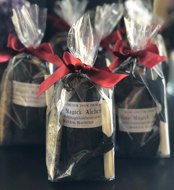 spell candle with herbal blend for protection magick and return to sender workings