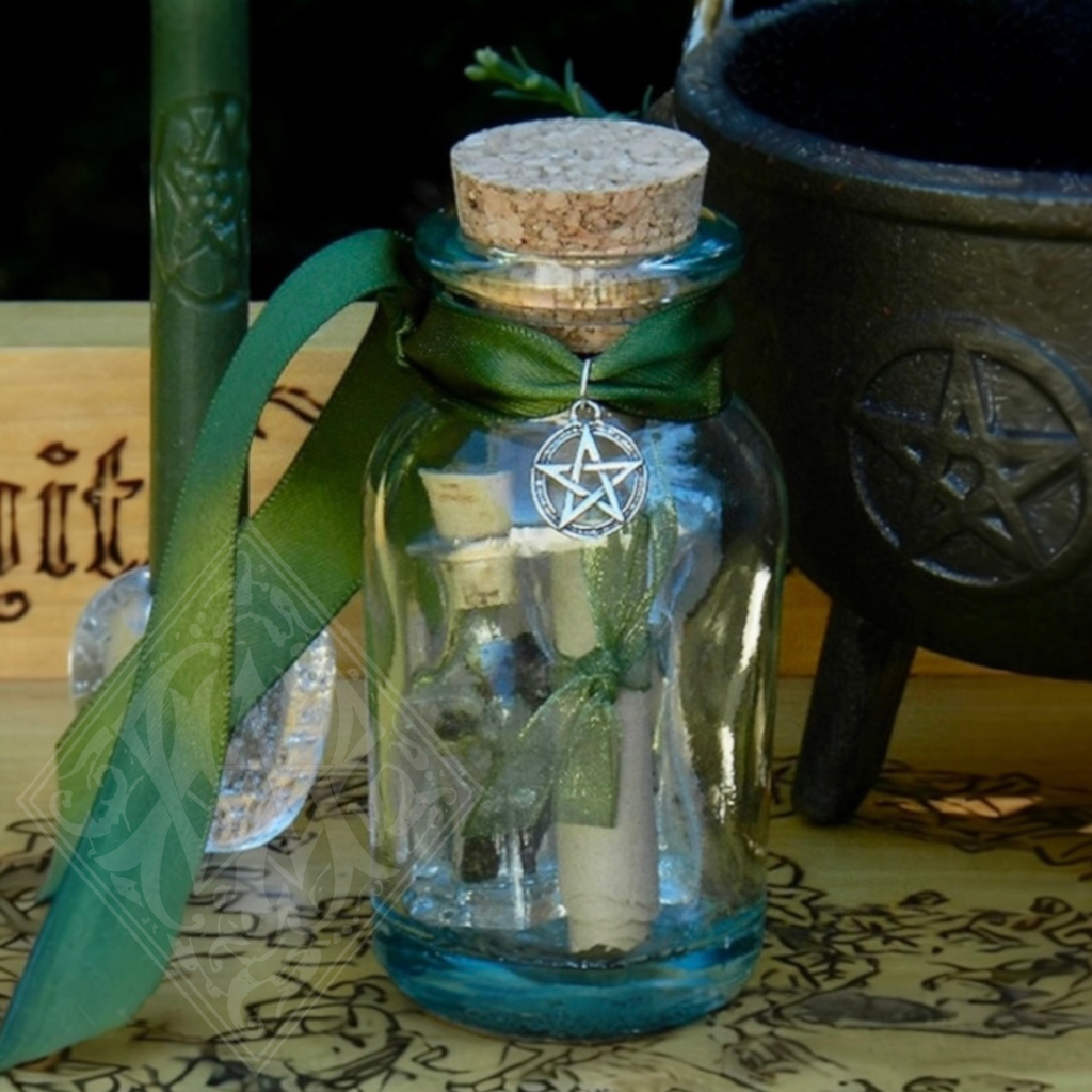 money drawing spell jar with green candle resin oil and pentacle charm for prosperity and financial abundance