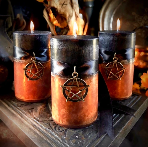 Samhain Pumpkin Candle by White Magick Alchemy featuring a black and orange pillar design for Halloween rituals and autumn celebrations
