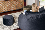 productimages/fooquibla/millo footstool black quilted lifestyle.jpg