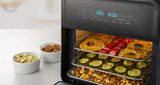 productimages/afp5300bk/afp5300bk_sunbeam_air_fryer_oven_all-in-one_lifestyle_dehydrate_fruits_2000x1060_0d618514e0.jpg