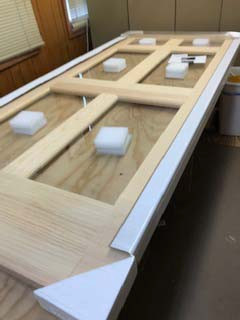 Packaged door, ready for box.