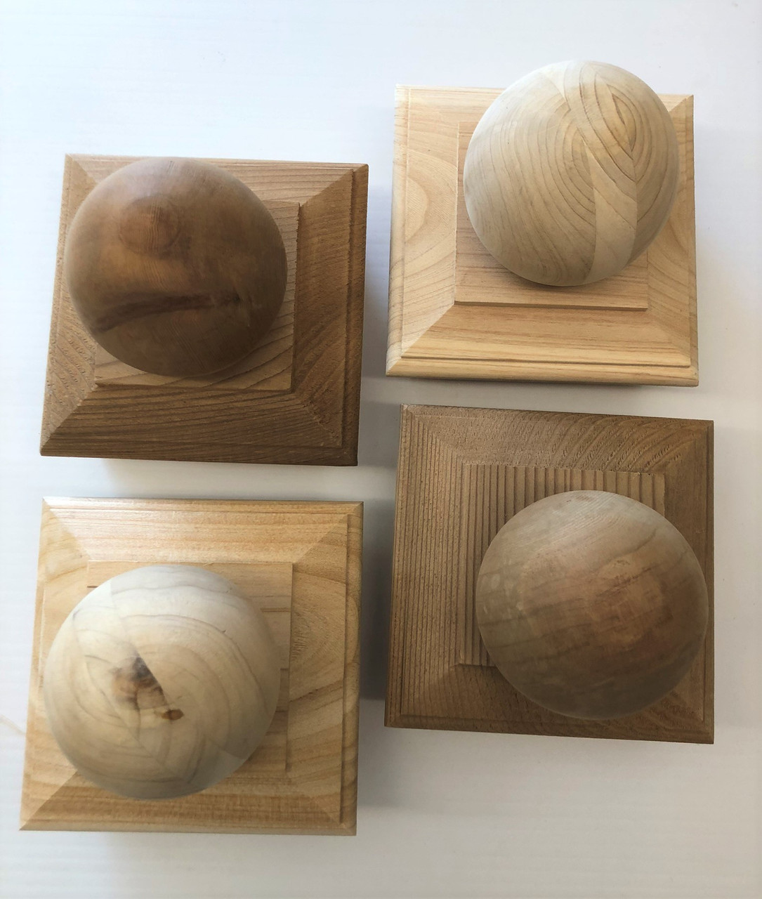 Cedar Ball Caps come in a variety of wood colors
