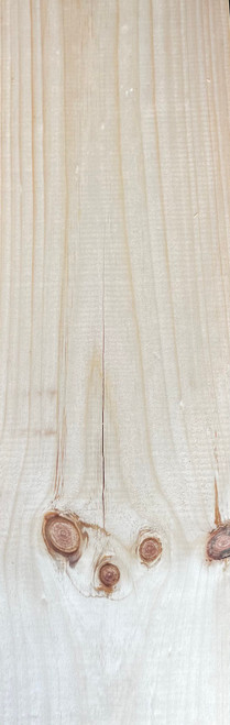 Face of  a Knotty white pine timber