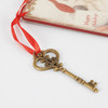 Double Sided Hanging Wooden Christmas Ornament - Santa's Magic Key 3x6 from Primitives by Kathy