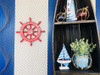 Handcrafted Red Decorative Ship Wheel With Sailboat 12" from Hampton Creations