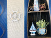 Handcrafted Rustic White Decorative Ship Wheel With Sailboat 12" from Hampton Creations