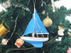 Handcrafted Wooden Light Blue Sailboat with Light Blue Sails Christmas Tree Ornament 9" from Hampton Creations Handcrafted Wooden Light Blue Sailboat with Light Blue Sails Christmas Tree Ornament 9" from Hampton Creations